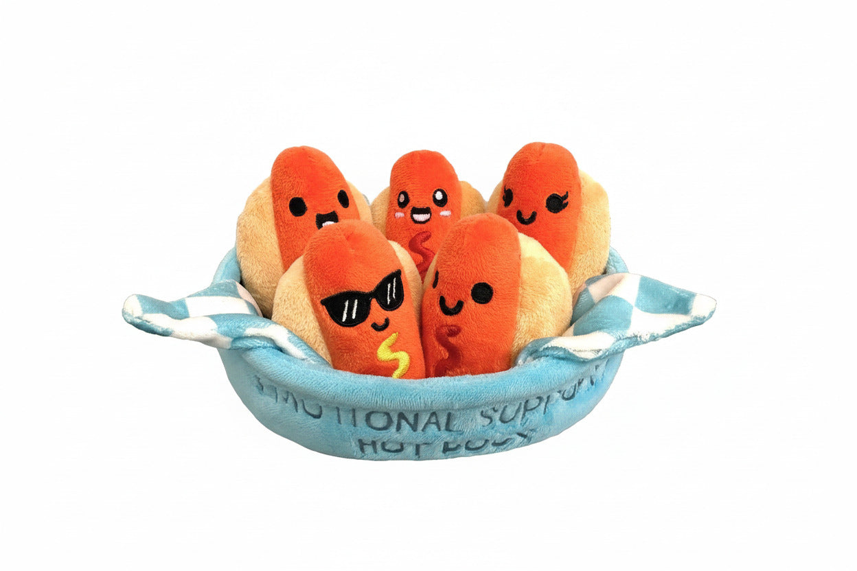 Plush toys resembling hot dogs in a blue basket on a white background