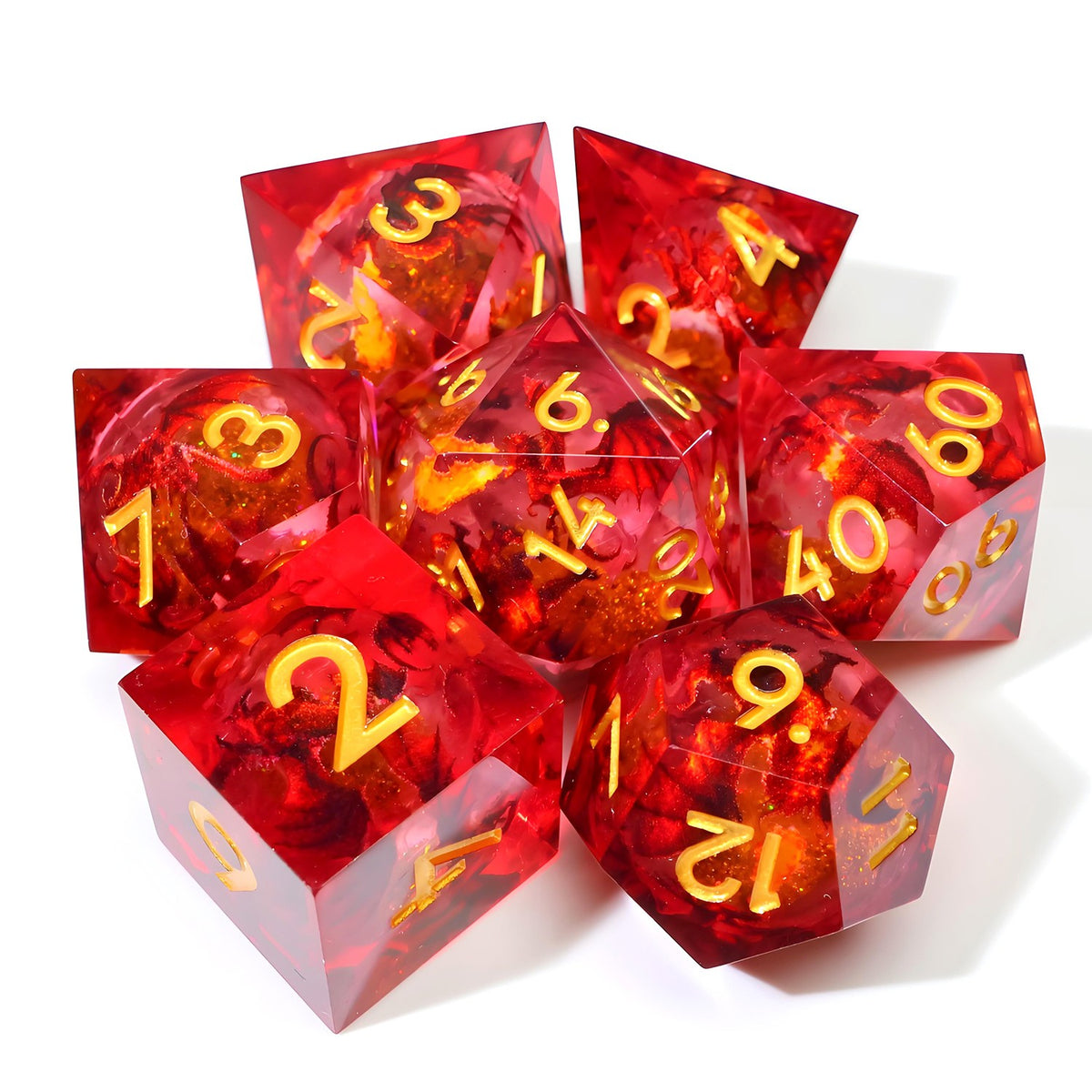 Clear red resin dice set with a dark red dragon and gold numbers