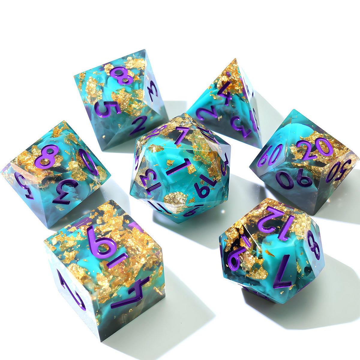 Turquoise resin dice set with gold leaf and purple numbers