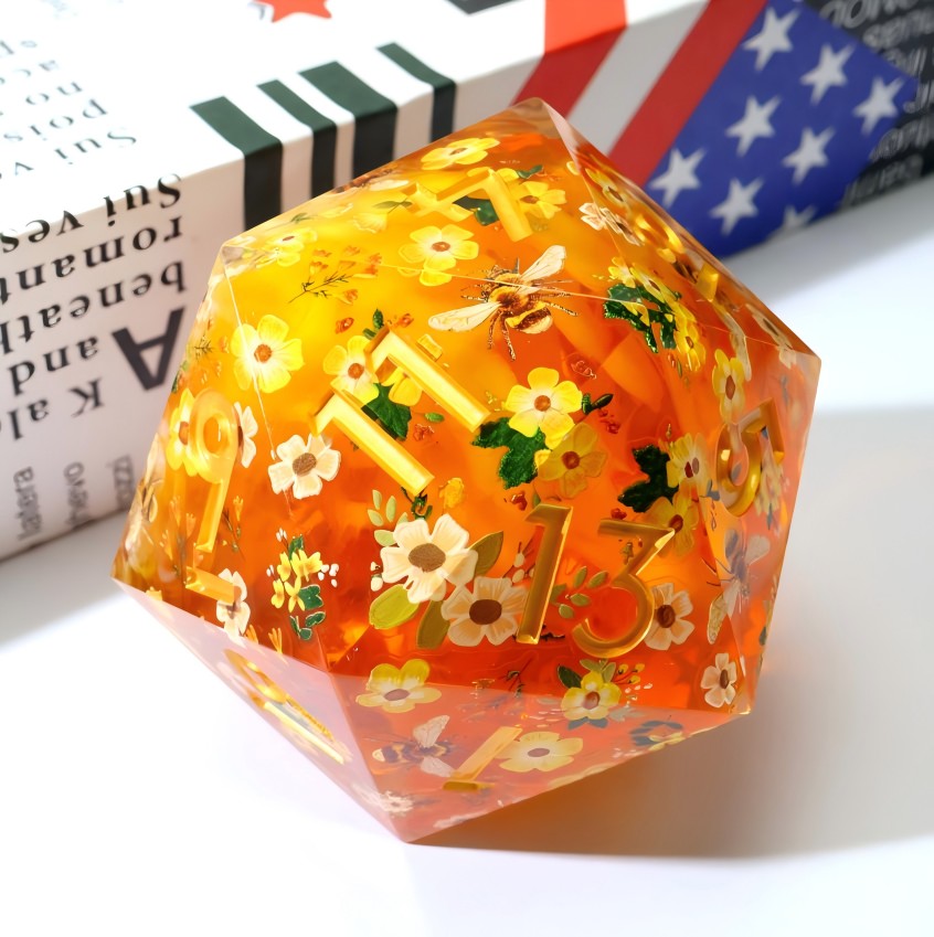 50 mm amber resin d20 with yellow and white flowers and gold numbers