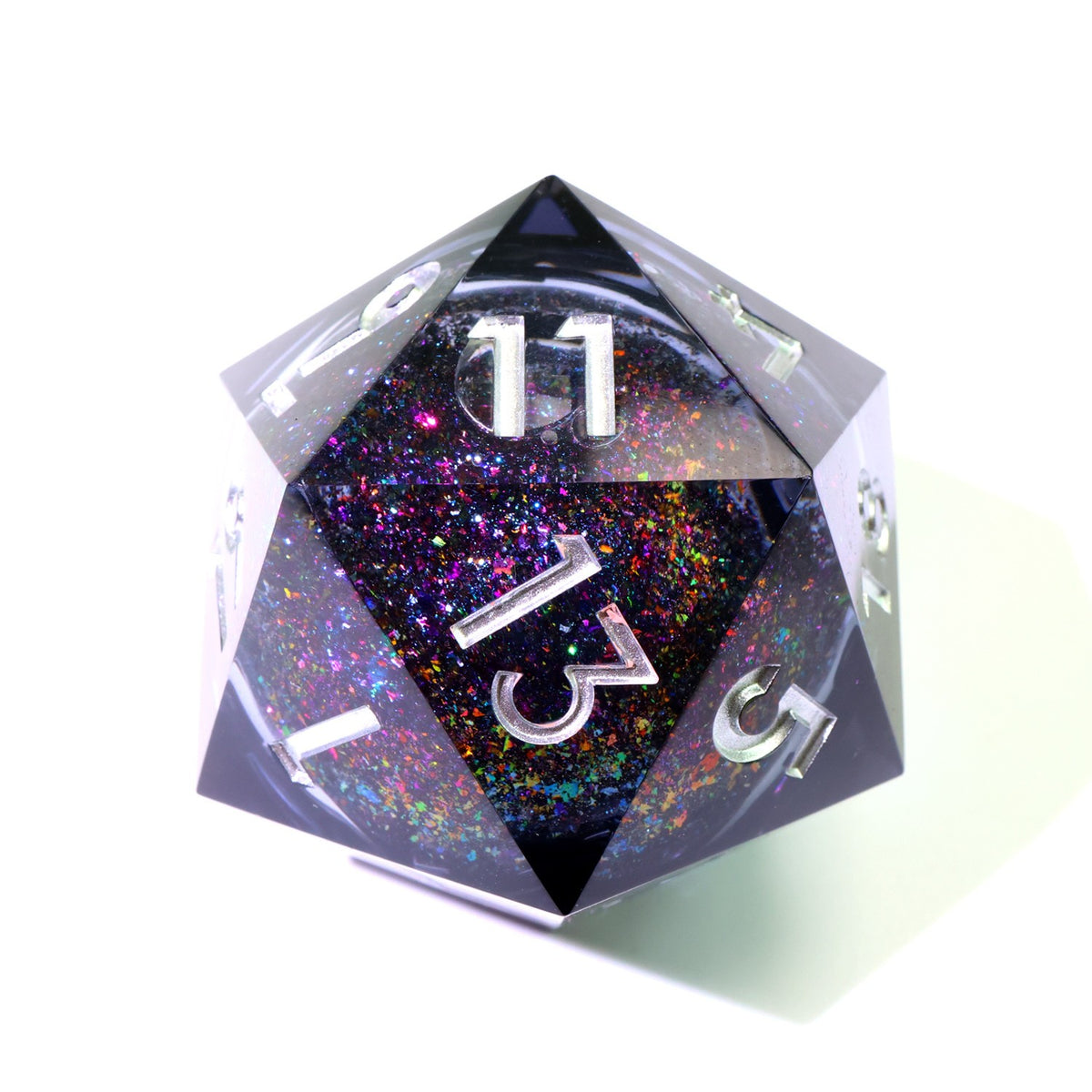 33 mm smoky black liquid core resin d20 with rainbow glitter and white numbers